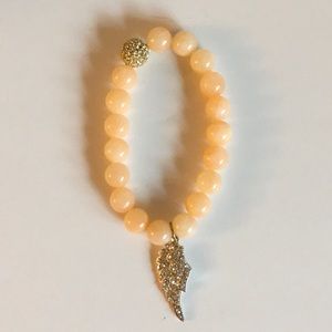 Angel wing charm bracelet with pave bead